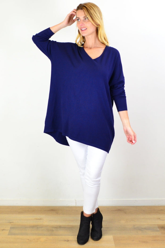 Navy blue wool blend fine knit tunic top by Cali&Co, close-up showing soft fabric and fitted style.