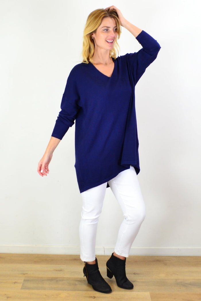 Navy blue wool blend fine knit tunic top by Cali&Co, featuring a soft, fitted design with long sleeves and a rounded neckline.