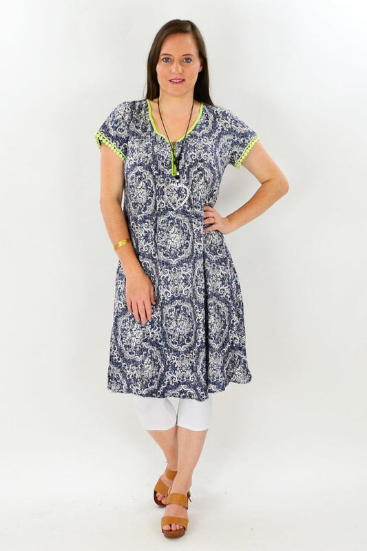 Navy Victorian tunic dress by Cafe Latte featuring lace details, high neckline, and long sleeves, displayed on a hanger.