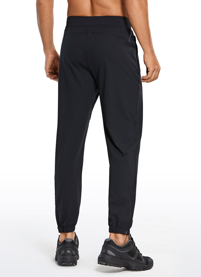 CRZ YOGA Men's Run Slim Fit On the Travel Joggers 28''- Ankle Zipper Black