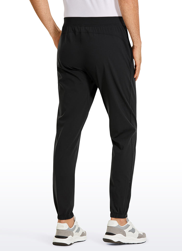 CRZ YOGA Men's Run Slim Fit On the Travel Joggers 32''- Ankle Zipper Black