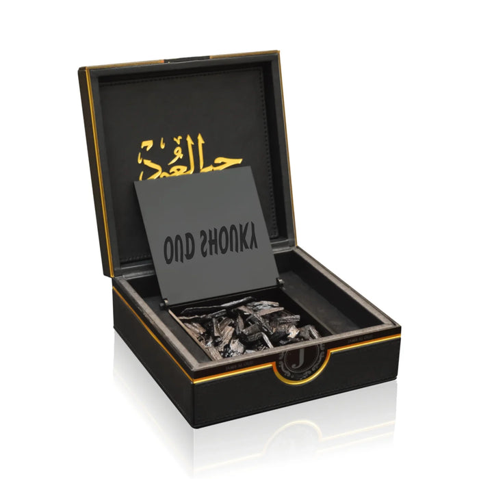 Luxury Jamr Al Oud oriental oud wood gift box with Arabic calligraphy and elegant packaging