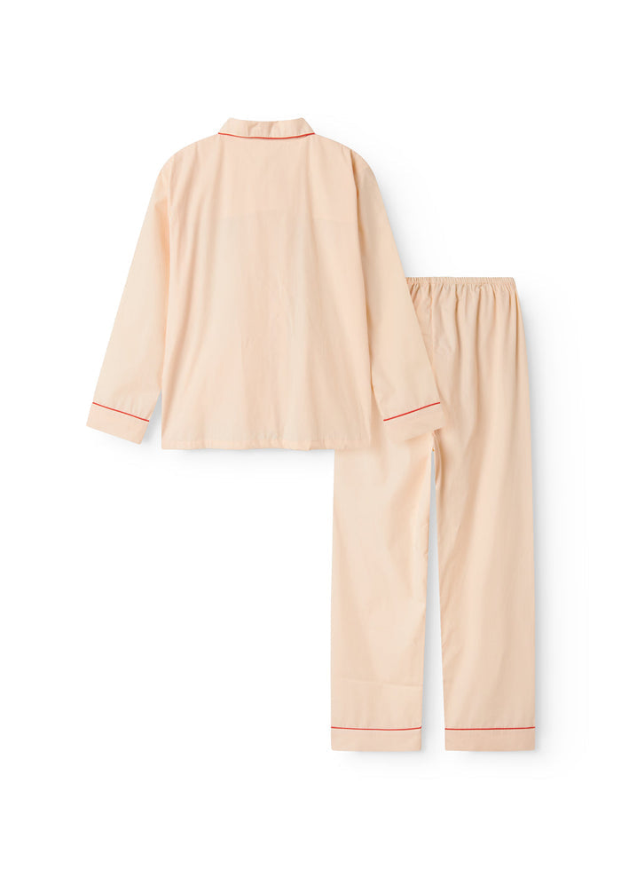Pyjamas sæt til børn i lys beige med orange piping: skjorte bagpå og bukser