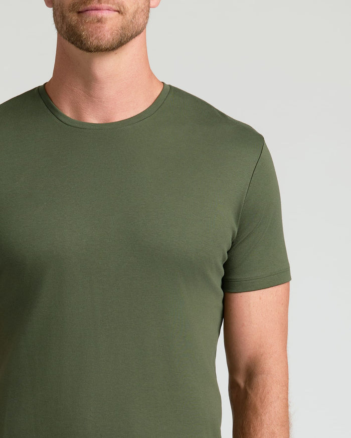Man wearing All Grove Pima Cotton Blend Crew 4-Pack t-shirt.