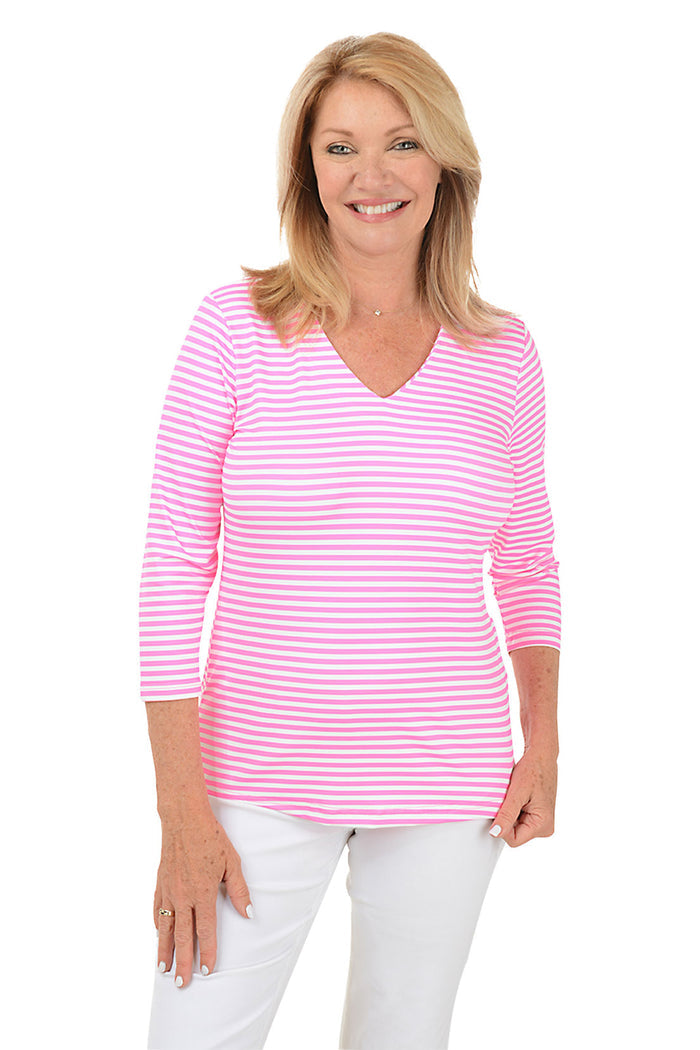 Woman wearing a pink and white striped shirt on a white background