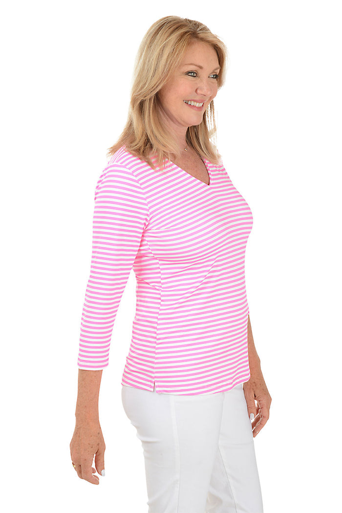 Woman wearing a pink and white striped shirt on a white background
