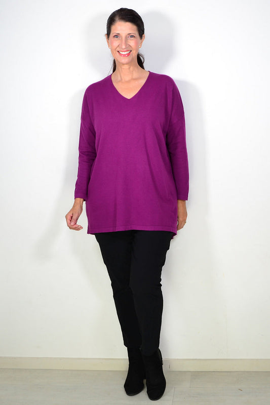 Cali&Co plum wine wool blend fine-knit tunic top displayed on a hanger, showcasing its soft texture and classic design.