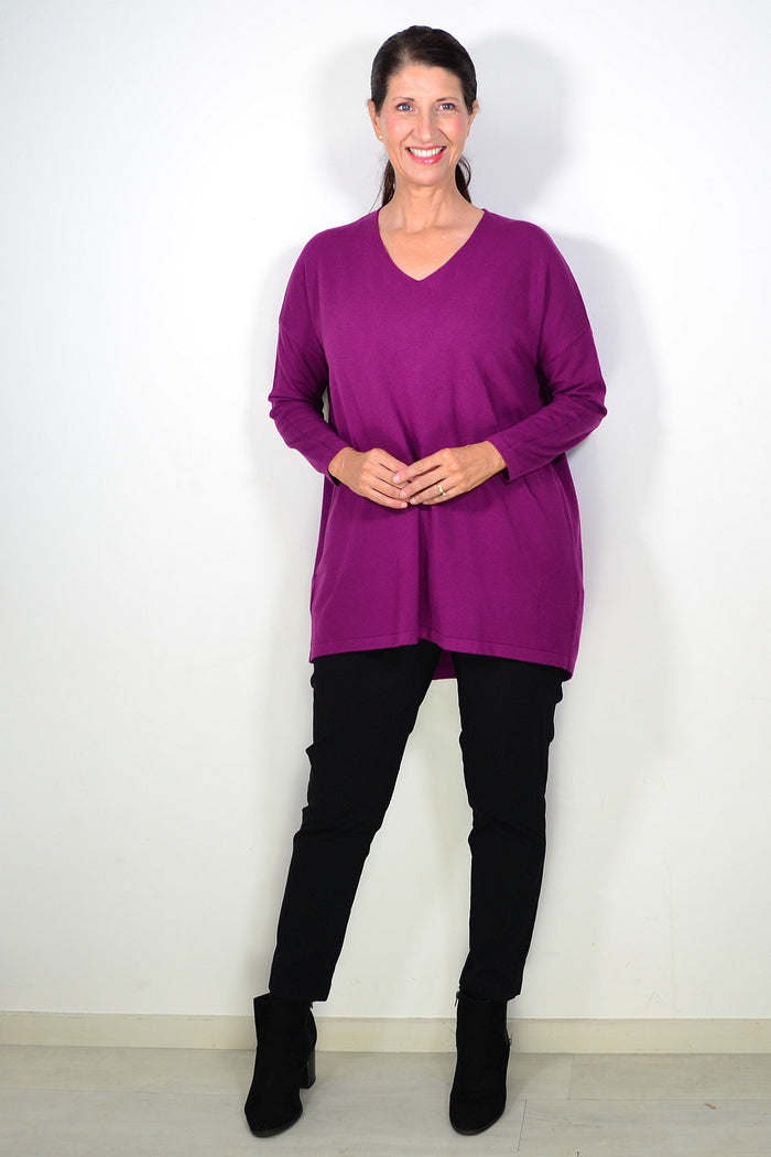 Cali&Co plum wine wool blend fine knit tunic top displayed on a hanger, showcasing its soft texture and elegant fit.