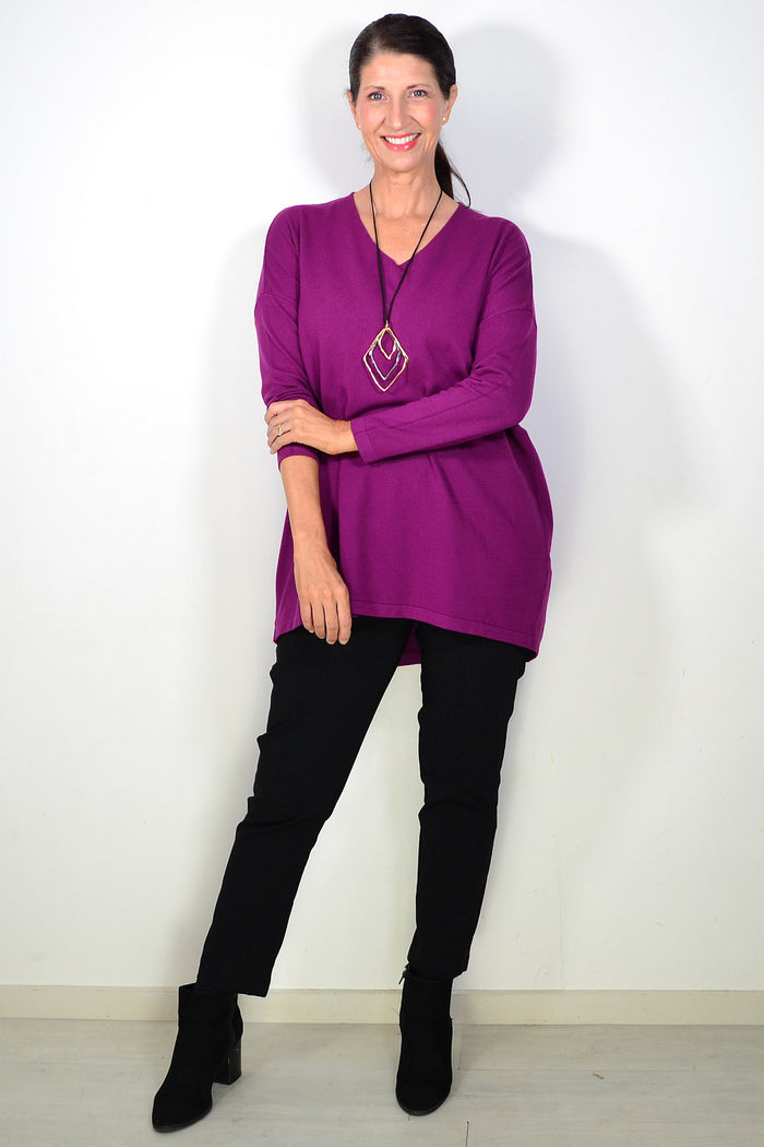 Cali&Co plum wine wool blend knit tunic top with long sleeves and relaxed fit, displayed on a hanger against a neutral background.