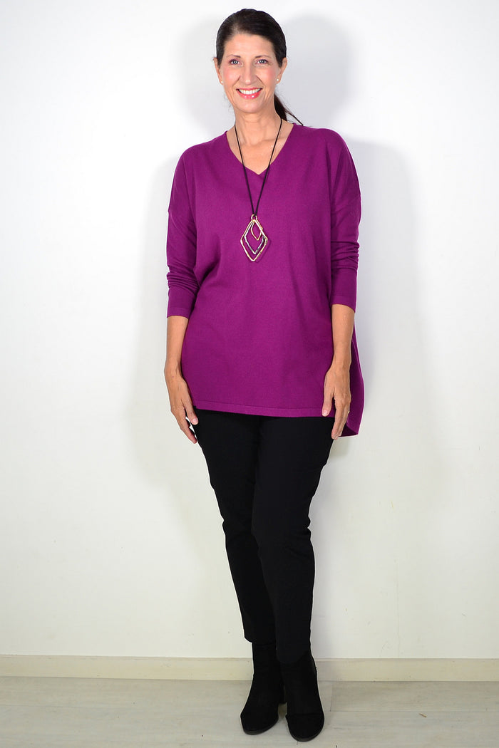 Cali&Co Plum Wine wool blend fine knit tunic top with long sleeves and round neckline, displayed on a hanger.