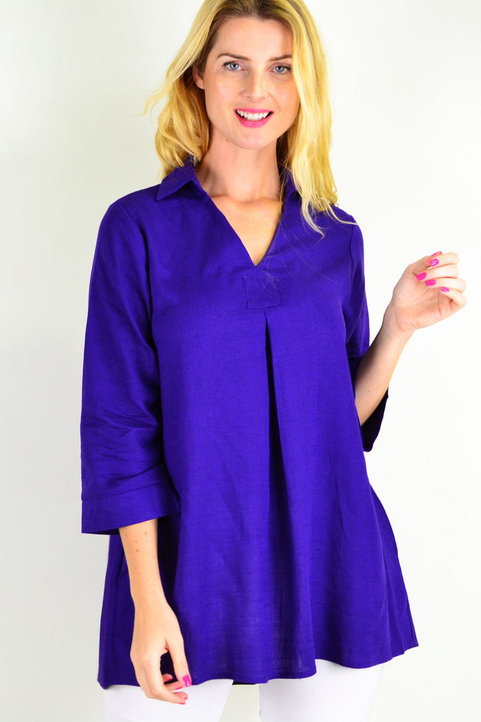 Purple pocket linen cotton tunic top by Ruby Rain, shown on a hanger with a relaxed fit and lightweight fabric.
