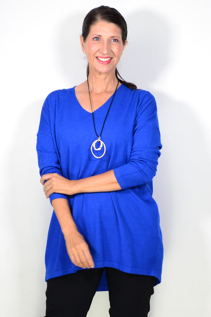 Royal blue wool blend fine knit tunic top by Cali&Co, featuring a close-up of the textured fabric and relaxed fit.