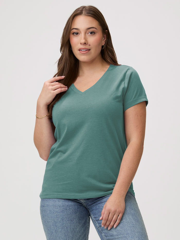 Laurel is 5'7" and wears a size M # Women's Model Wears a Medium in Sagebrush Green V-Neck | FCT