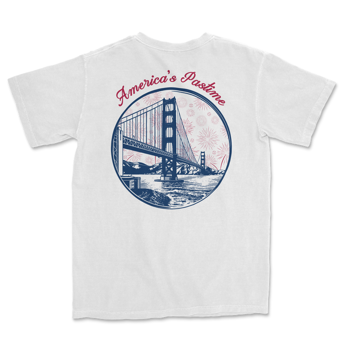 White t-shirt featuring a graphic of the Golden Gate Bridge with "America's Pastime" text and fireworks design.