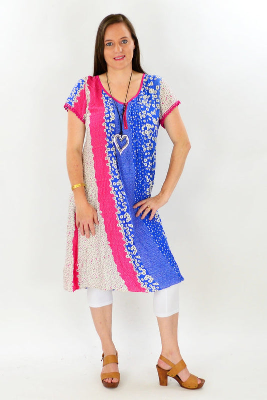 Cafe Latte Shellies Tunic Dress in soft fabric with a relaxed fit and stylish neckline, displayed on a mannequin.