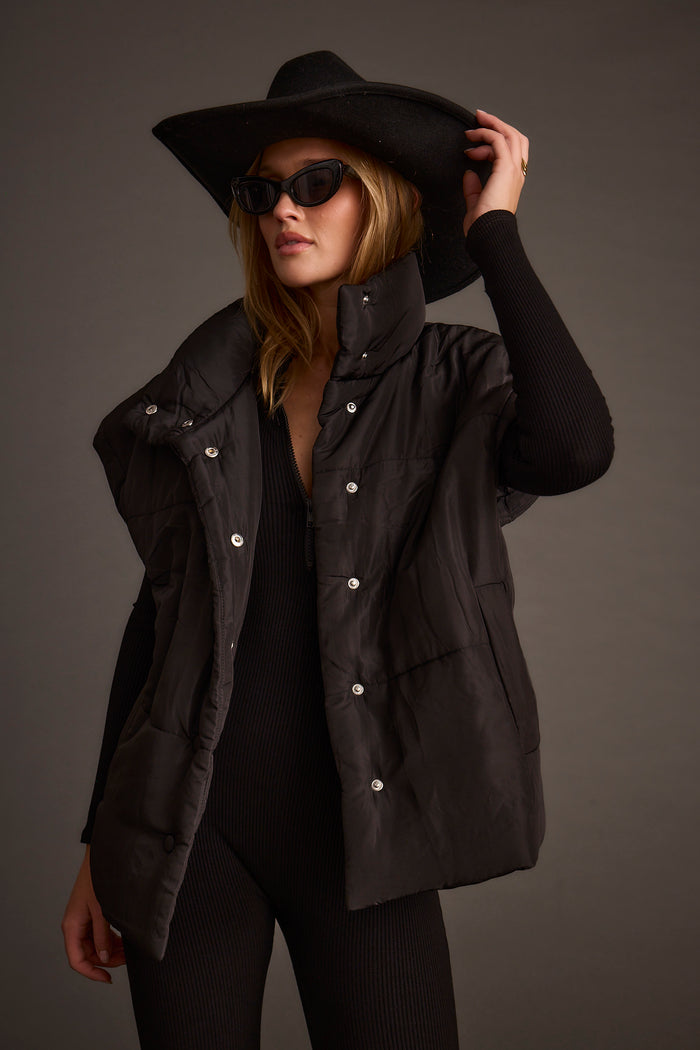 Detail shot of the Summit Black Puffer Vest highlighting the design elements.