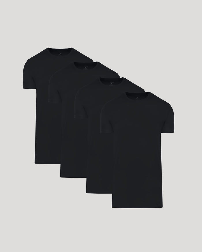Four black crew neck t-shirts in a Tall Pima Cotton Blend Crew 4-Pack, displayed in a staggered arrangement against a light background, men's basics.