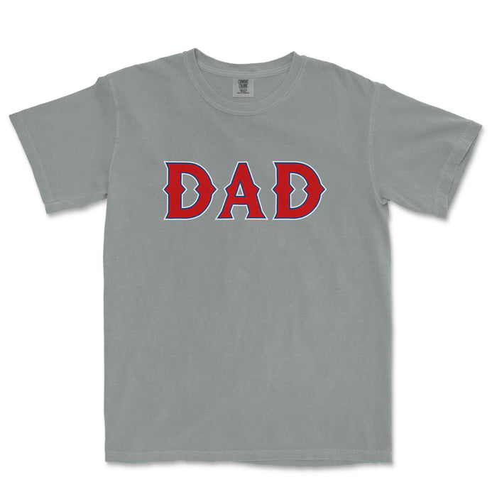 Gray T-shirt with "DAD" in bold red and blue lettering, perfect for Texas baseball dad supporters.