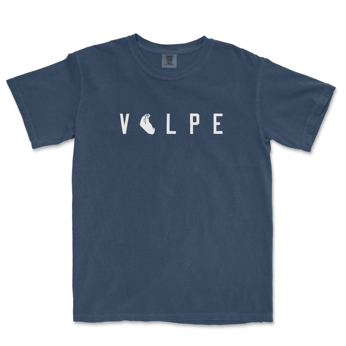 Blue T-shirt with the word "VOLPE" printed across the chest, featuring a hand illustration replacing the letter "O".