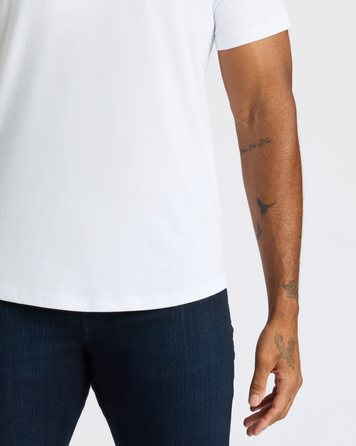 All White Curved Hem Classic Crew Neck 10-Pack showcased with tattoos.