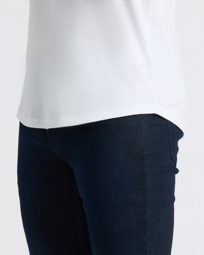 All White Curved Hem Classic Crew Neck 10-Pack worn with indigo jeans.