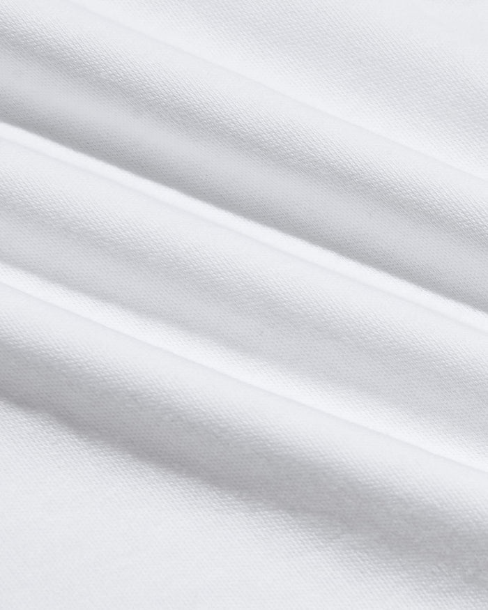 Close-up of soft white fabric texture showcasing the smooth, breathable material used in the Pima Cotton Blend Crew 4-Pack men's basics.